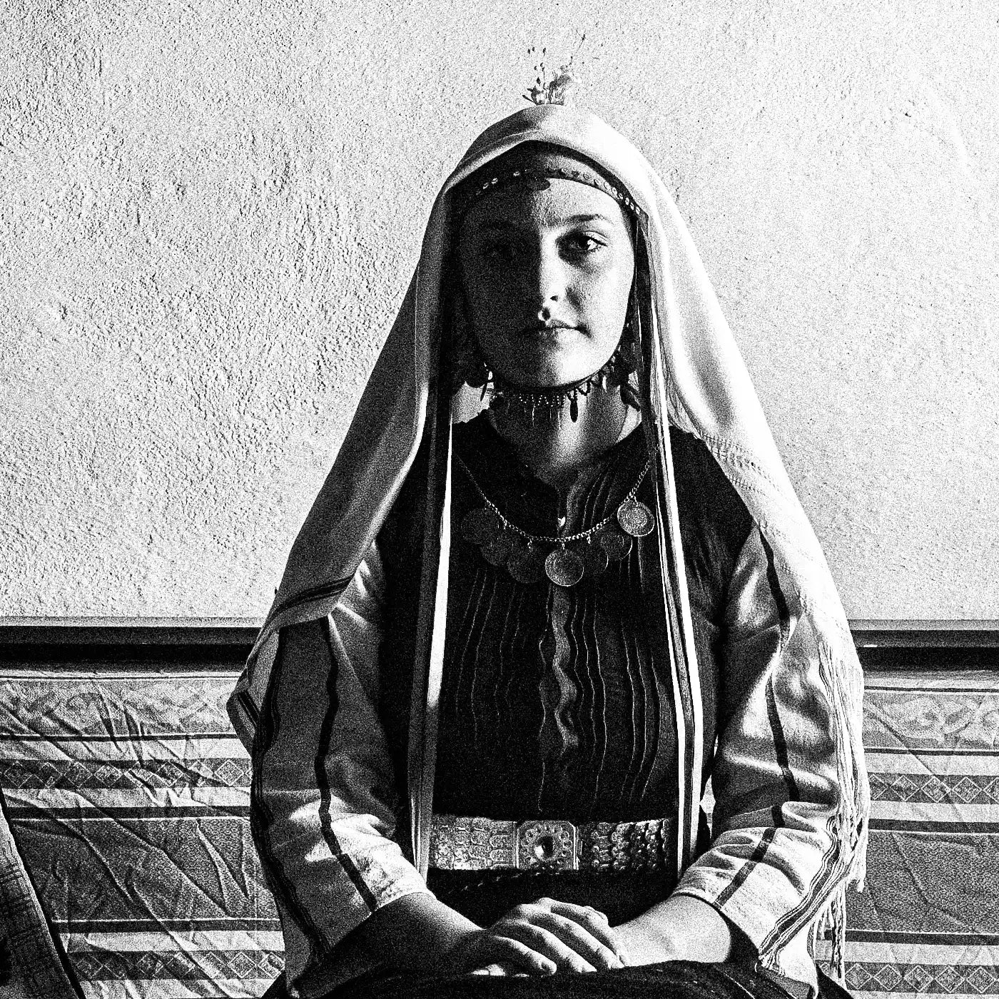 Black and White Photography Wall Art Greece | Lady in couch Mani Thrace by George Tatakis - detailed view