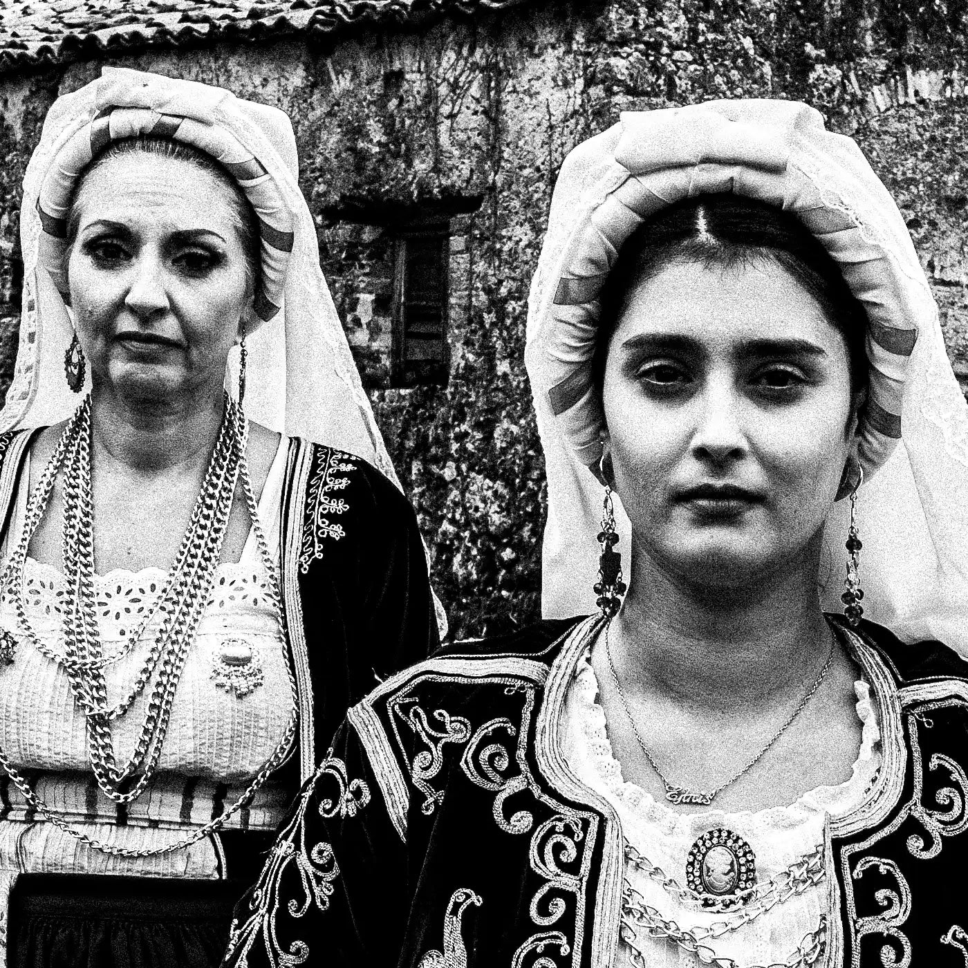 Black and White Photography Wall Art Greece | Costumes of northern Corfu island in front a traditional house Ionian Sea by George Tatakis - detailed view