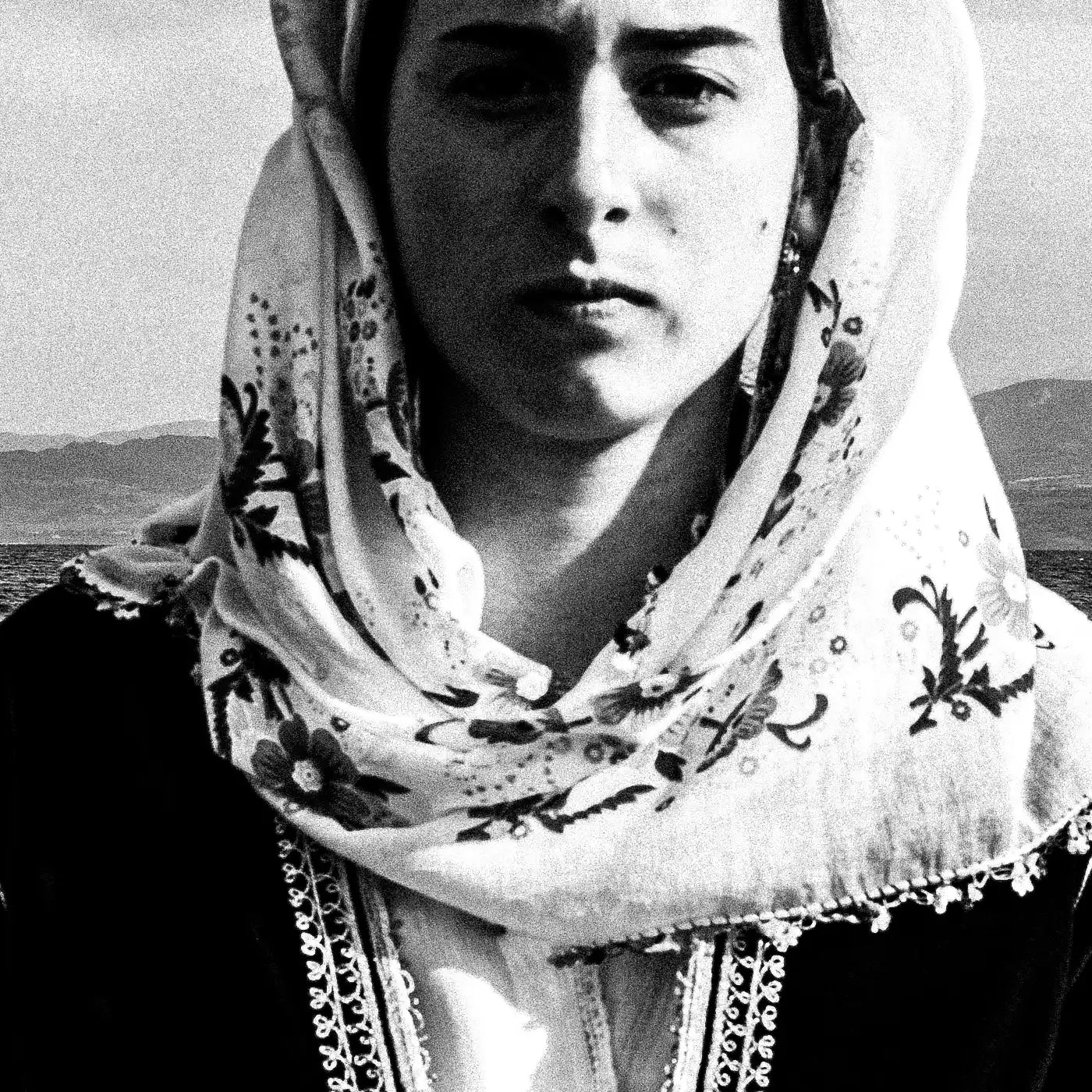 Black and White Photography Wall Art Greece by George Tatakis | A woman in the costume of Kymi, Euboea island - detailed view