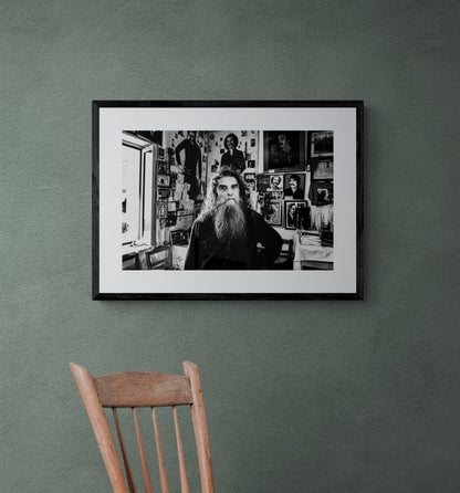 Black and White Photography Wall Art Greece | Antonis Xylouris (Psarantonis) in his brother’s house Anogia Crete by George Tatakis - single framed photo