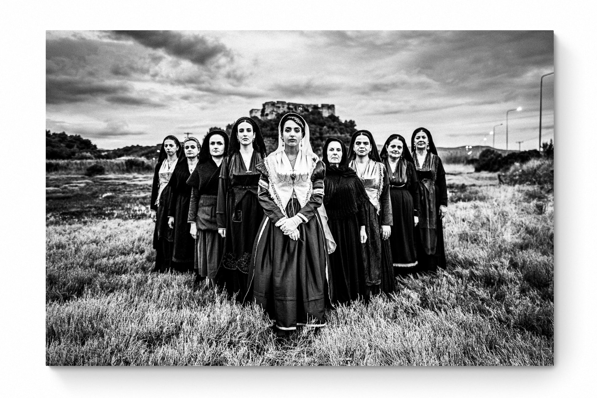 Black and White Photography Wall Art Greece | Costumes of Lefkada island at a castle multiple generations Ionian Sea by George Tatakis - whole photo