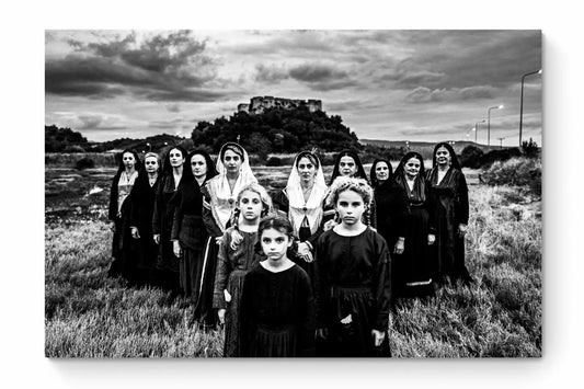 Black and White Photography Wall Art Greece | Costumes of Lefkada island at a castle multiple generations Ionian Sea by George Tatakis - whole photo