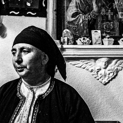 Black and White Photography Wall Art Greece | Woman in a traditional house Olympos Karpathos Dodecanese by George Tatakis - detailed view
