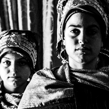 Black and White Photography Wall Art Greece | Three ladies in the traditional costumes of Symi island inside a house Dodecanese Greece by George Tatakis - detailed view