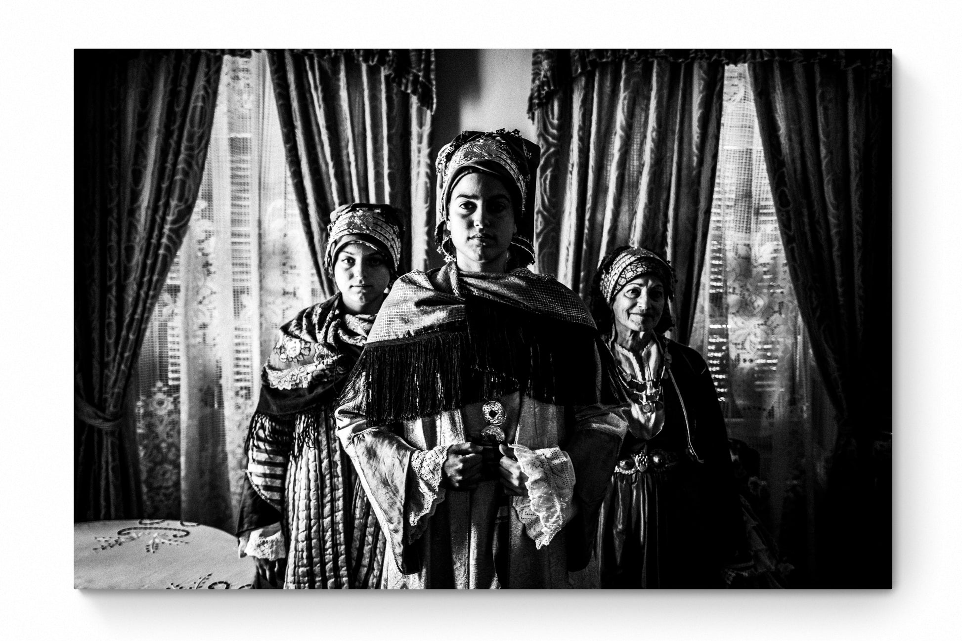 Black and White Photography Wall Art Greece | Three ladies in the traditional costumes of Symi island inside a house Dodecanese Greece by George Tatakis - whole photo