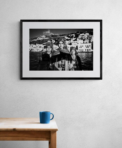 Black and White Photography Wall Art Greece | Three ladies on a boat in the traditional costumes of Symi island Dodecanese Greece by George Tatakis - single framed photo