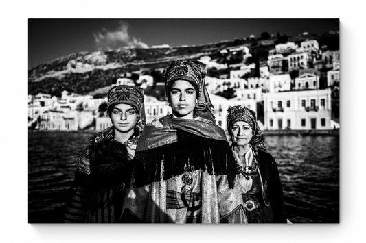 Black and White Photography Wall Art Greece | Three ladies on a boat in the traditional costumes of Symi island Dodecanese Greece by George Tatakis - whole photo