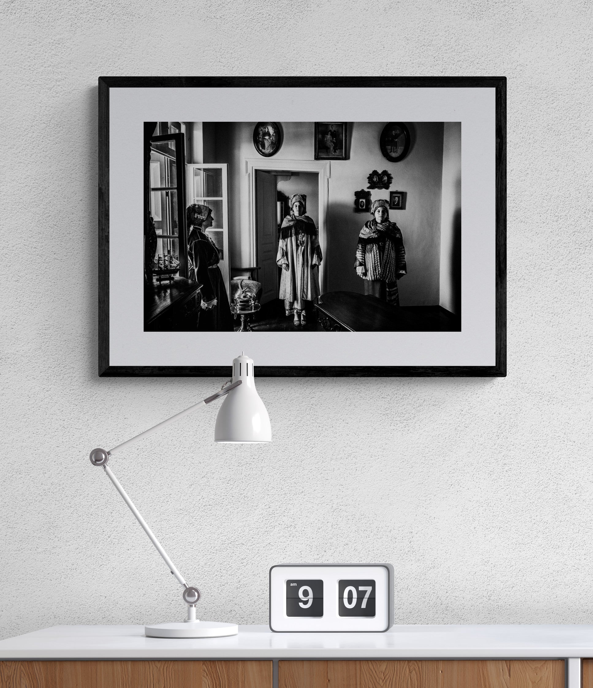 Black and White Photography Wall Art Greece | Three ladies in the traditional costumes of Symi island inside a room with frames Dodecanese by George Tatakis - single framed photo