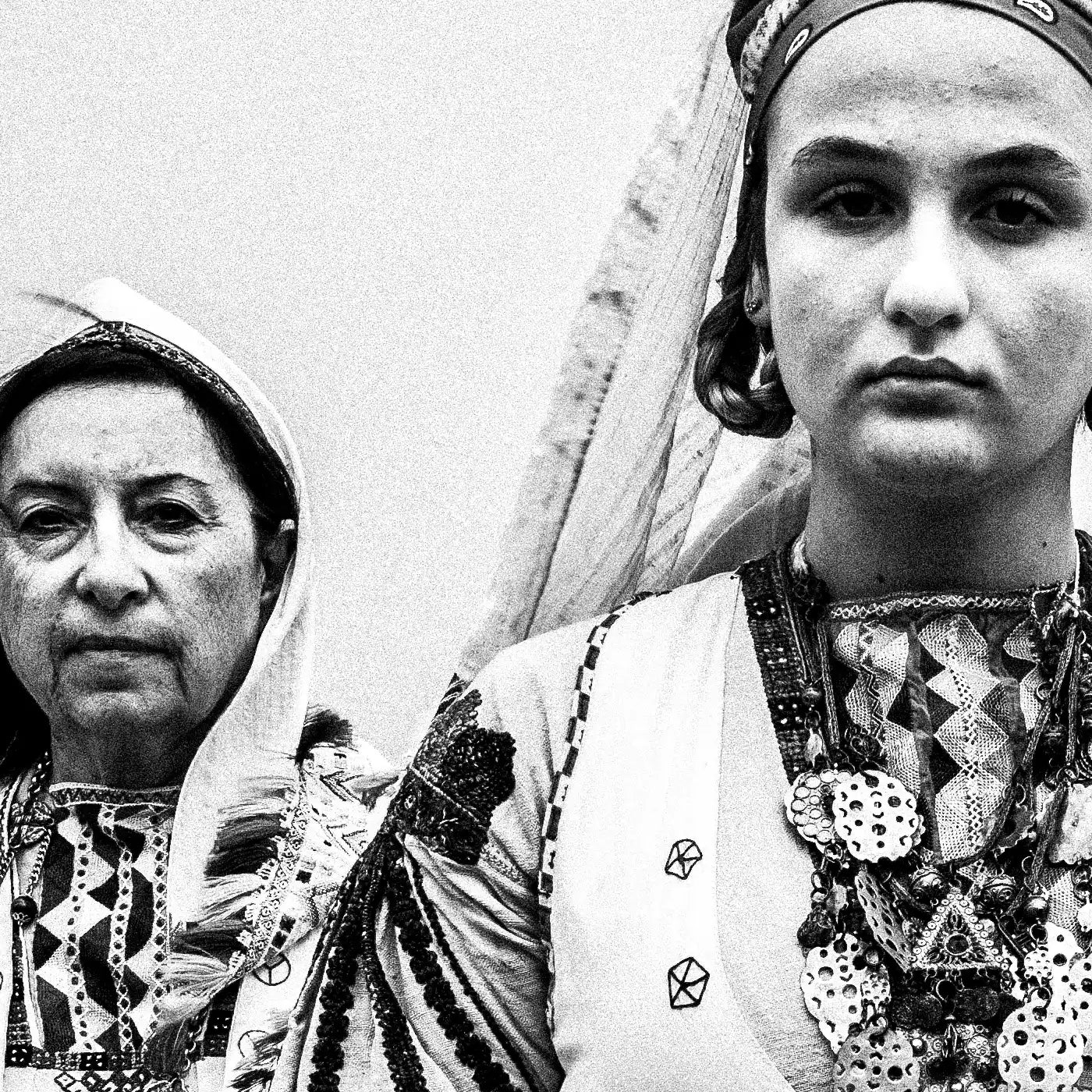 Black and White Photography Wall Art Greece | Costumes of Tilos island on a cliff Dodecanese Greece by George Tatakis - detailed view