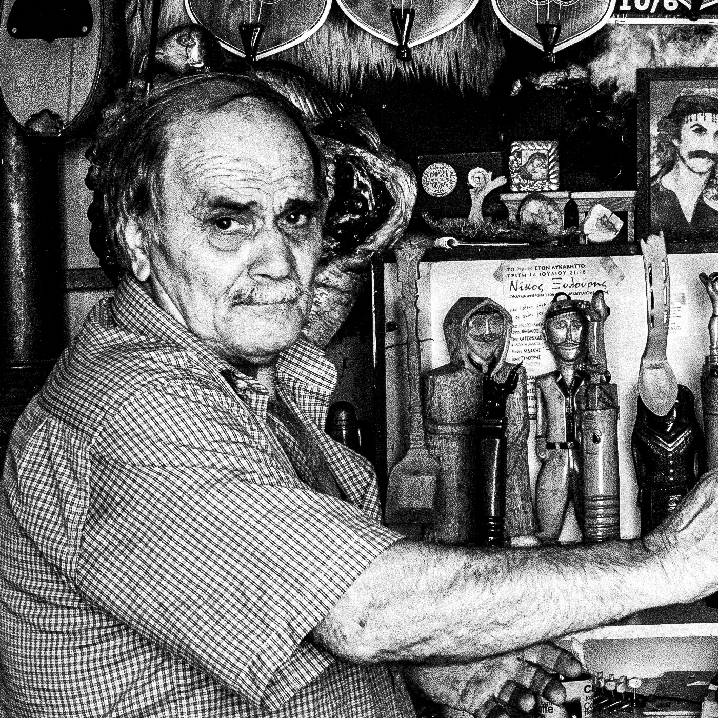 Black and White Photography Wall Art Greece | Man in his music instrument workshop Anogia Crete by George Tatakis - detailed view