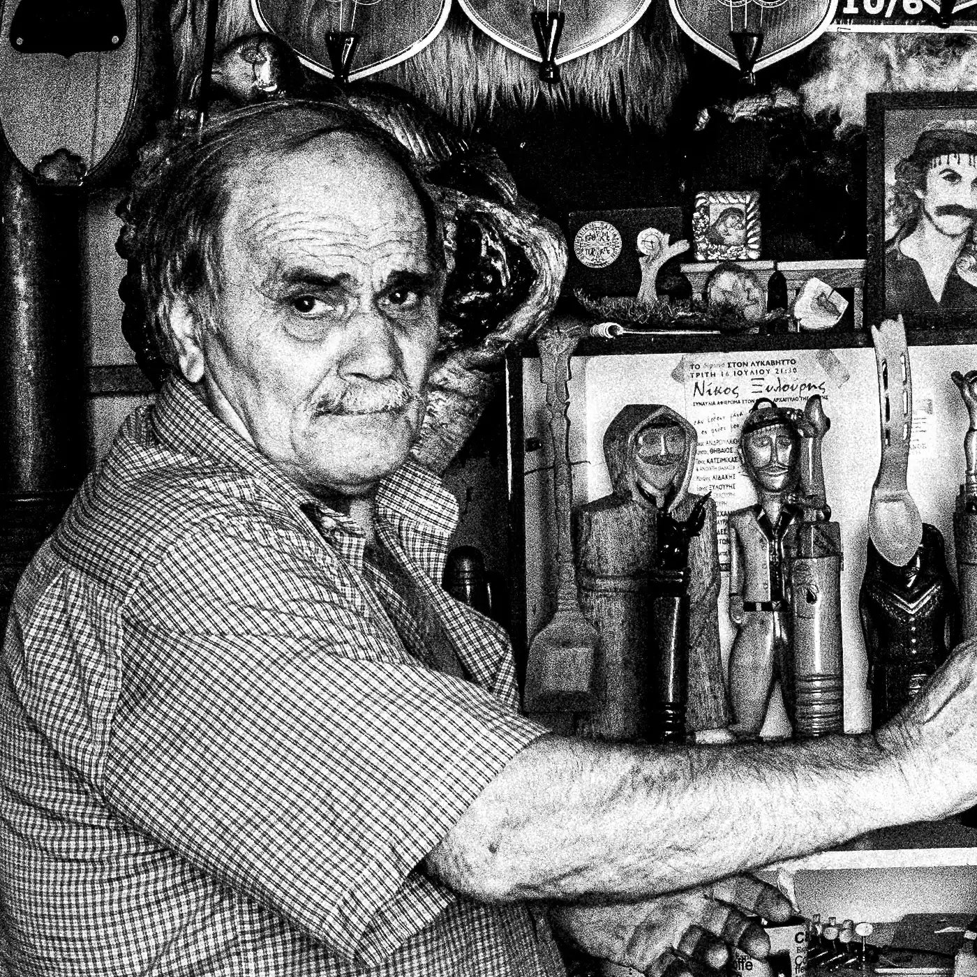 Black and White Photography Wall Art Greece | Man in his music instrument workshop Anogia Crete by George Tatakis - detailed view