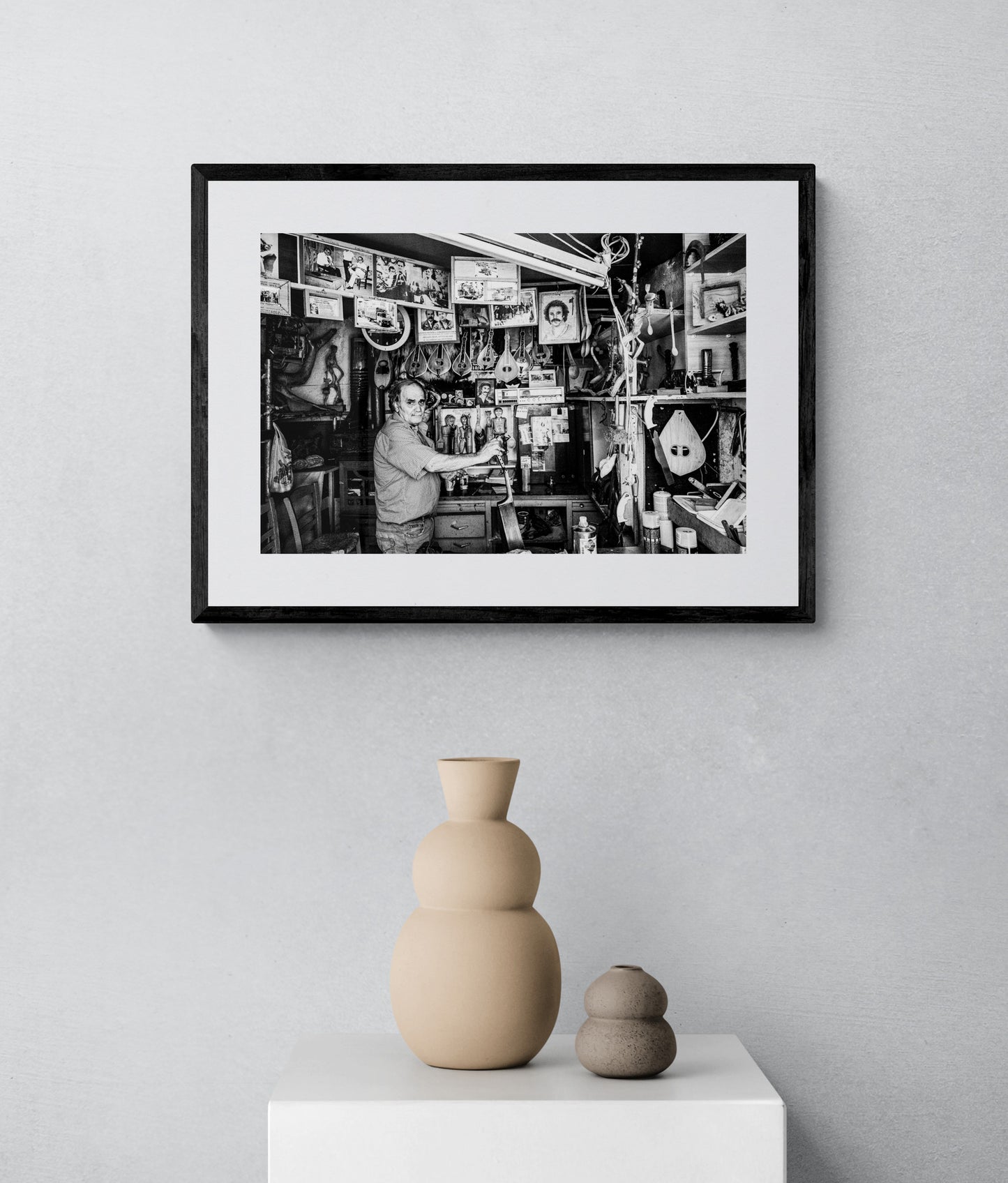 Black and White Photography Wall Art Greece | Man in his music instrument workshop Anogia Crete by George Tatakis - single framed photo