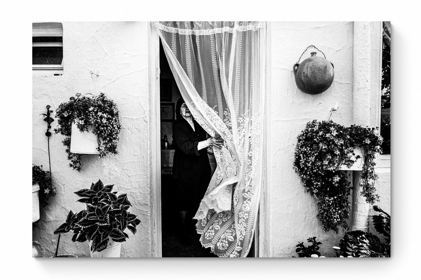 Black and White Photography Wall Art Greece | Lady in Anogia behind a curtain Crete by George Tatakis - whole photo