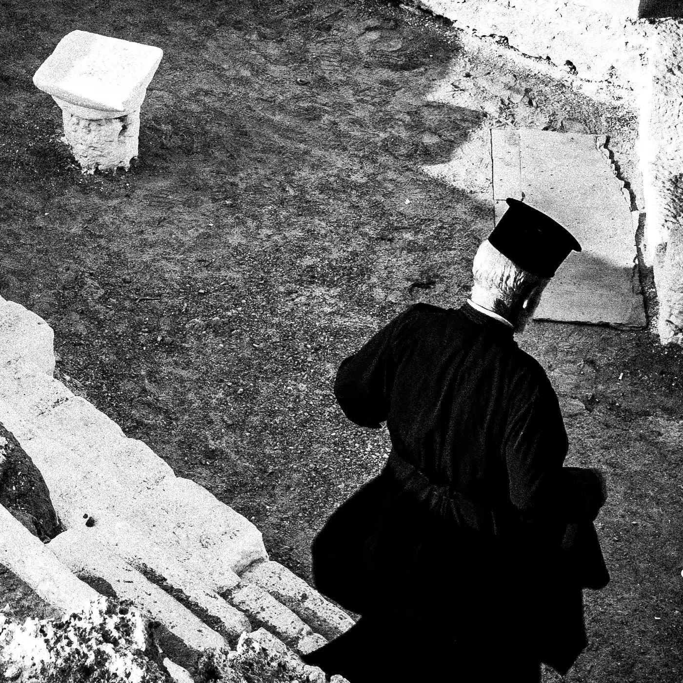 Black and White Photography Wall Art Greece | Priest descending to the St. John church in Vrykounta Olympos Karpathos Dodecanese by George Tatakis - detailed view