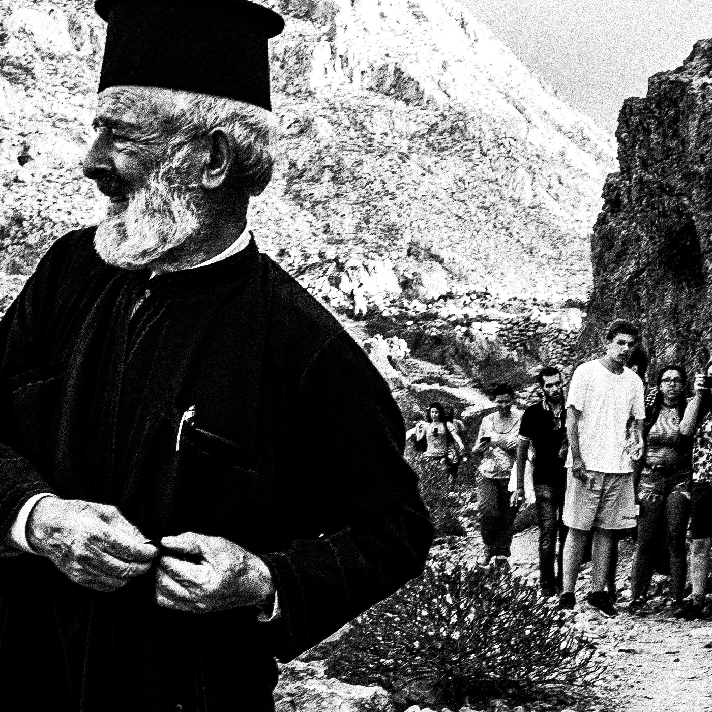 Black and White Photography Wall Art Greece | Priest at the St. John celebration in Vrykounta Olympos Karpathos Dodecanese by George Tatakis - detailed view
