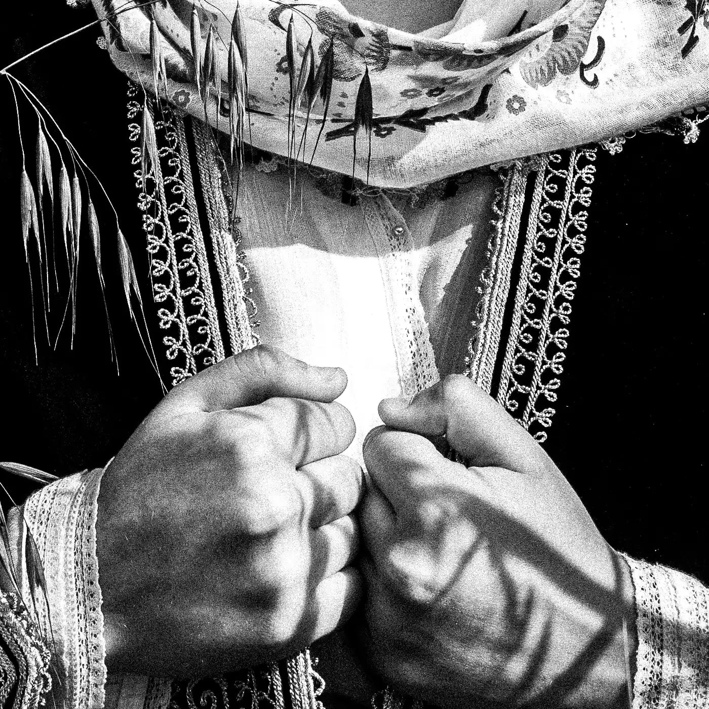 Black and White Photography Wall Art Greece by George Tatakis | A woman in the costume of Kymi in a field of straws, Euboea island - detailed view