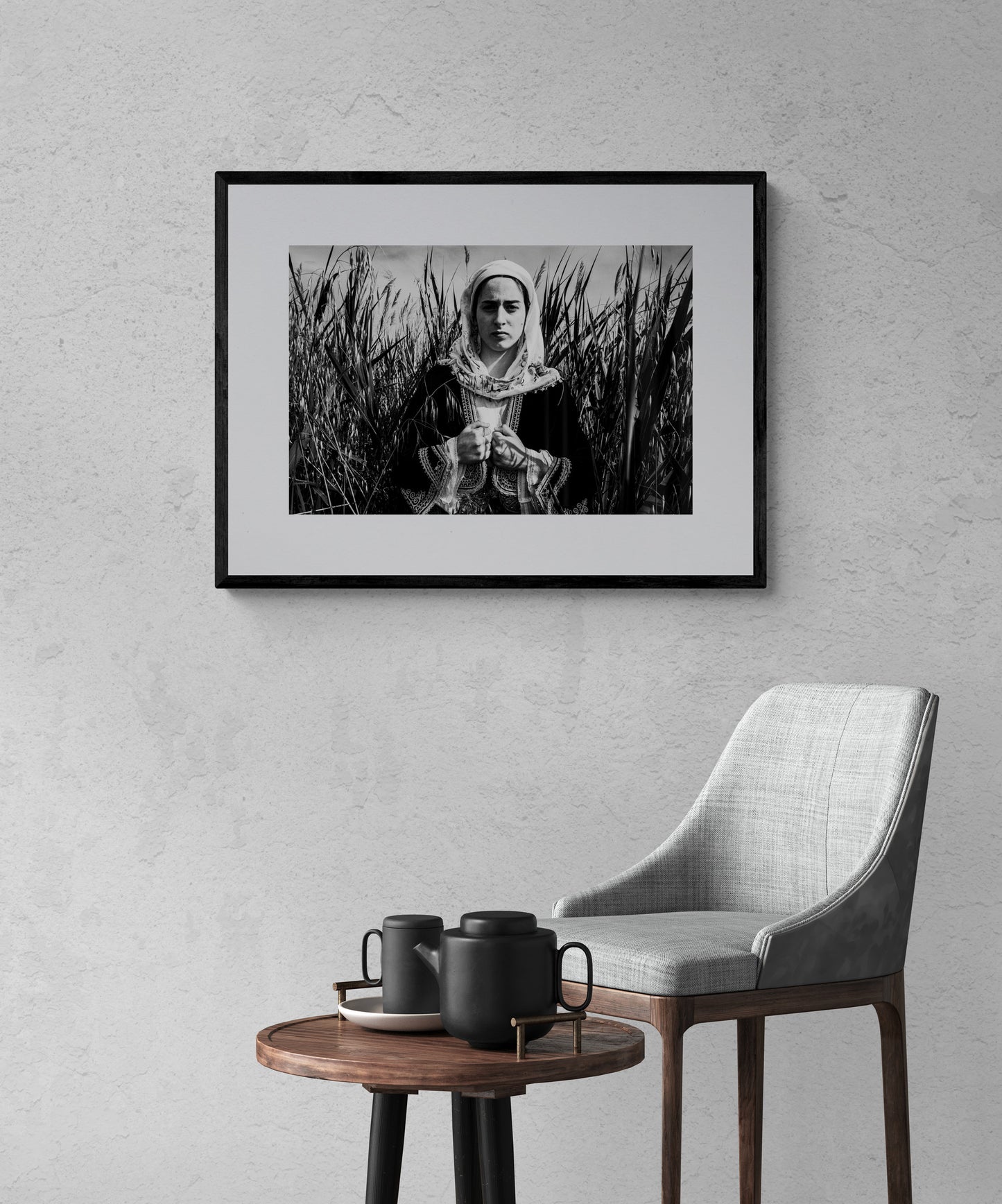 Black and White Photography Wall Art Greece by George Tatakis | A woman in the costume of Kymi in a field of straws, Euboea island - single framed photo