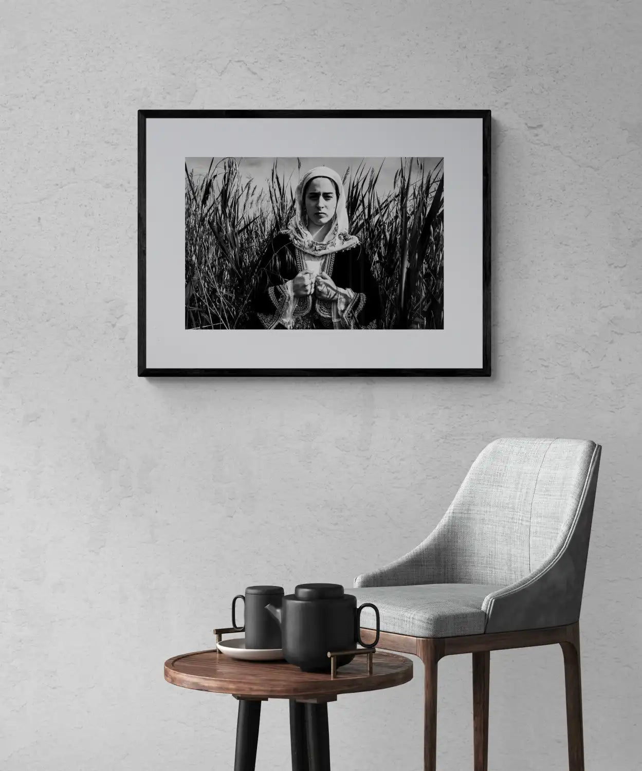 Black and White Photography Wall Art Greece by George Tatakis | A woman in the costume of Kymi in a field of straws, Euboea island - single framed photo