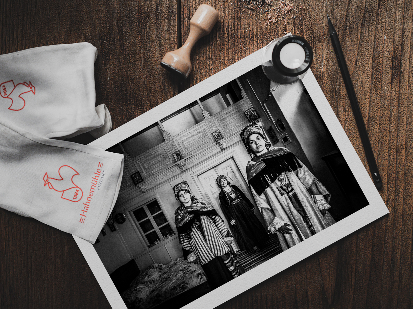 Black and White Photography Wall Art Greece | Three ladies in the traditional costumes of Symi island inside a house Dodecanese Greece by George Tatakis - photo print on table
