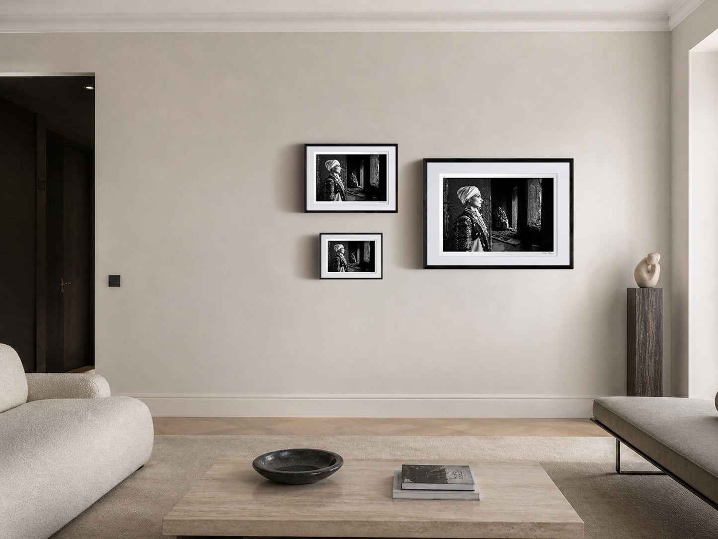 Woman in profile and two supporting figures in Kyparissia costumes, Peloponnese, Greece. Black and white photography frame sizing by George Tatakis.