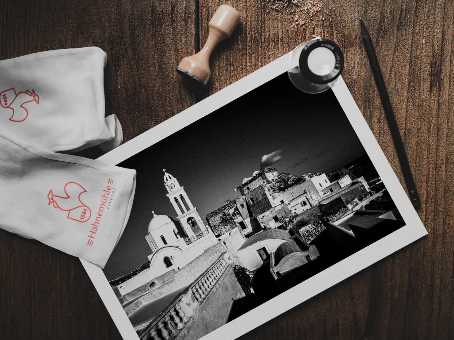 Santorini, Akrotiri. Castle View | Chorōs | Black-and-white wall art photography from Greece - print on table