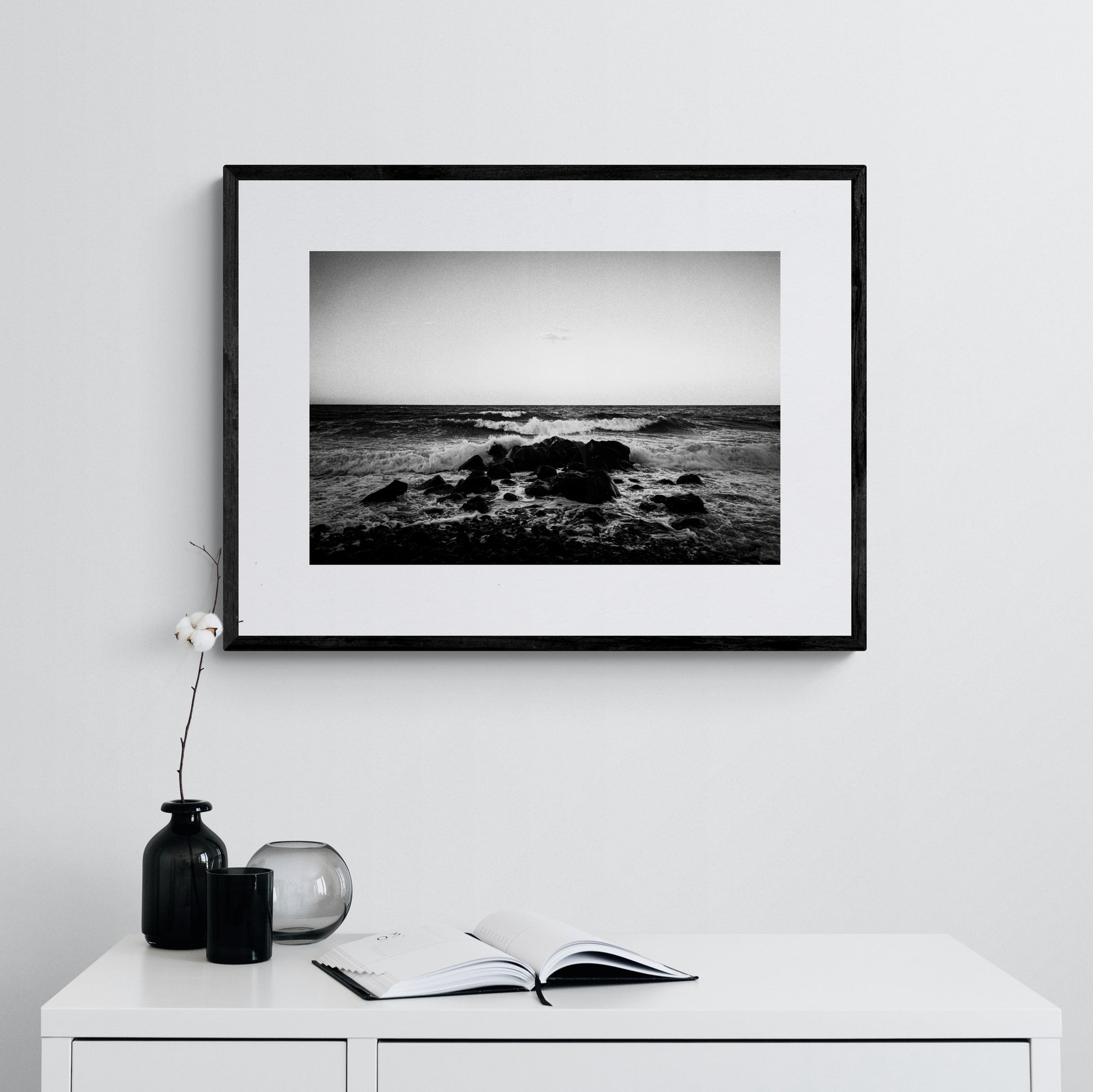 Santorini, Waves crushing on a boulder | Chorōs | Black-and-white wall art photography from Greece - single framed photo