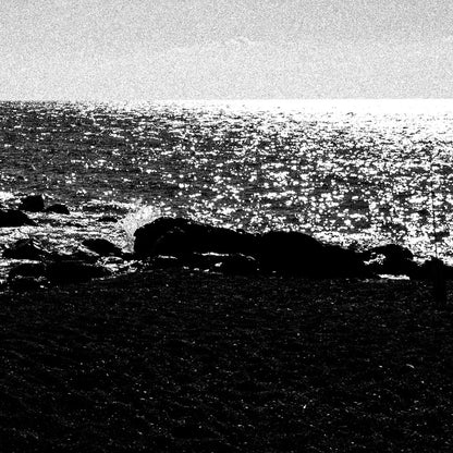 Calm Sunlit Sea | Santorini | Chorōs | Black-and-white wall art photography from Greece - detailed view