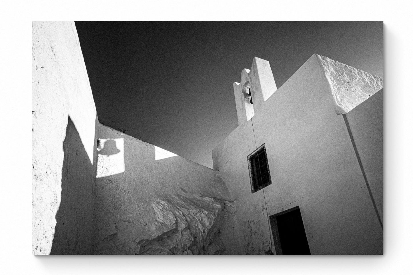 Bell and Shadow | Santorini | Chorōs | Black-and-white wall art photography from Greece - whole photo