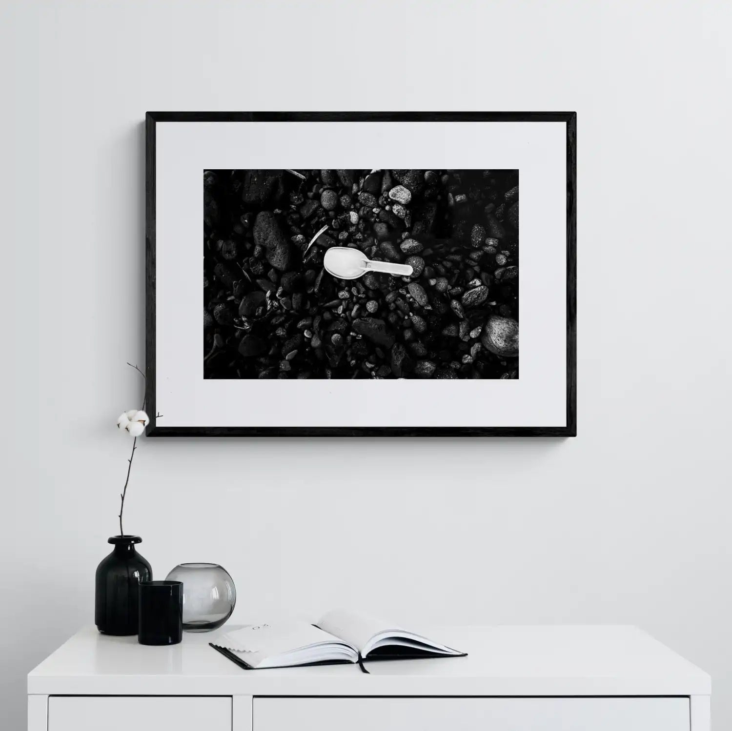 Black Pebbles and Shovel | Santorini | Chorōs | Black-and-white wall art photography from Greece - single framed photo
