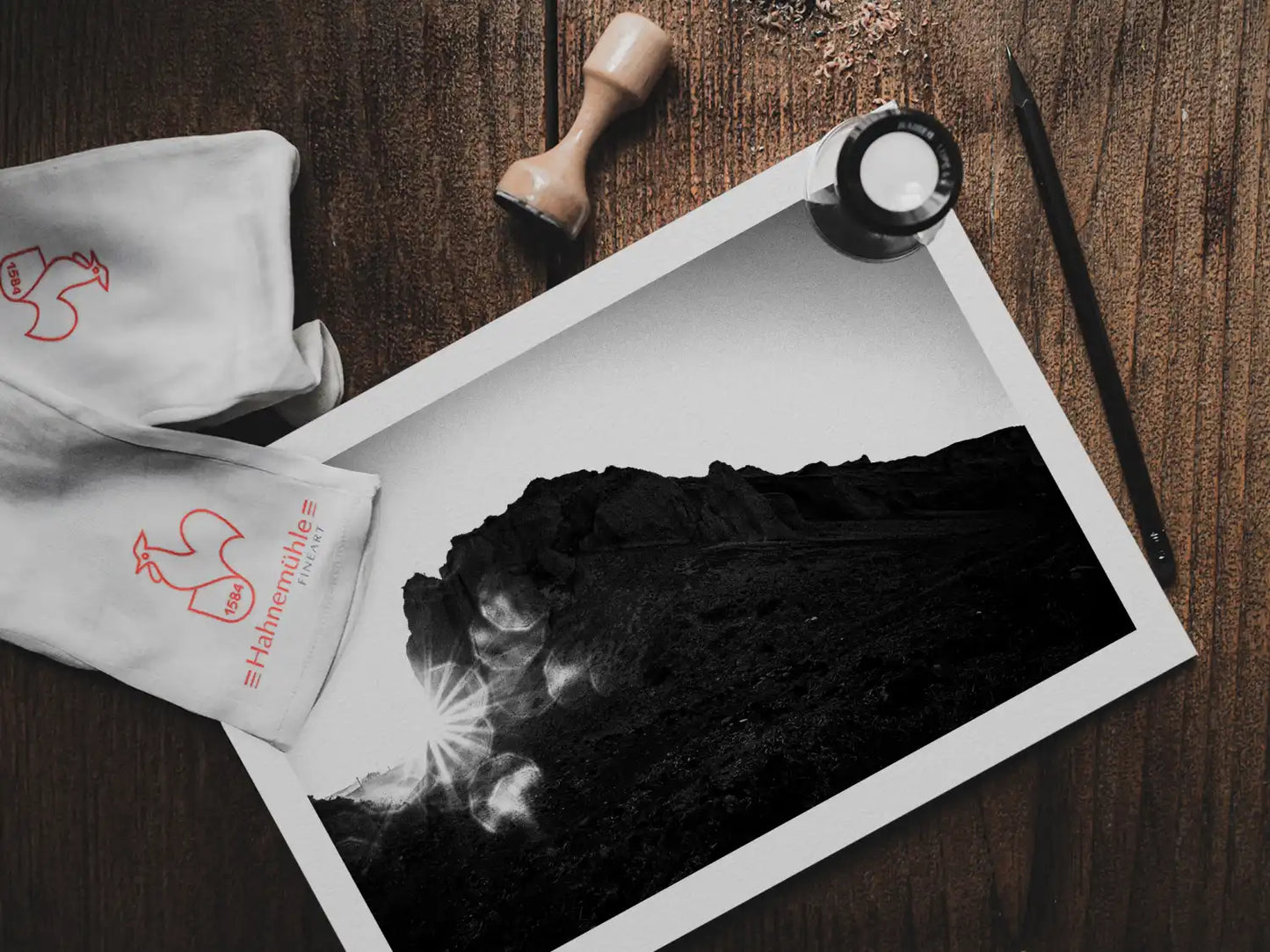 Rock and Sun | Santorini | Chorōs | Black-and-white wall art photography from Greece - photo print on table