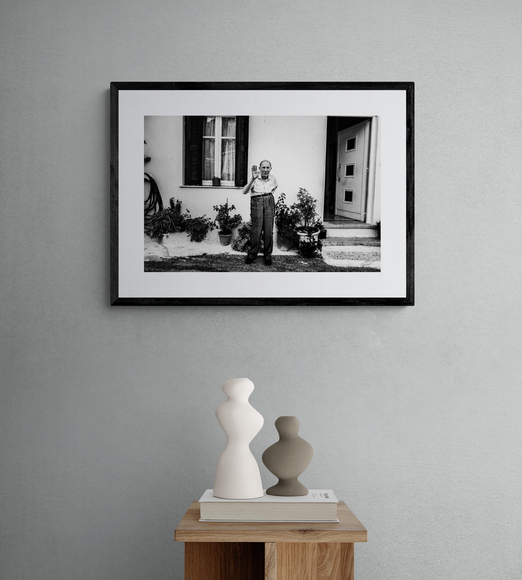 Black and White Photography Wall Art Greece | A man waving at Spilli Rethymnon Crete - single frame