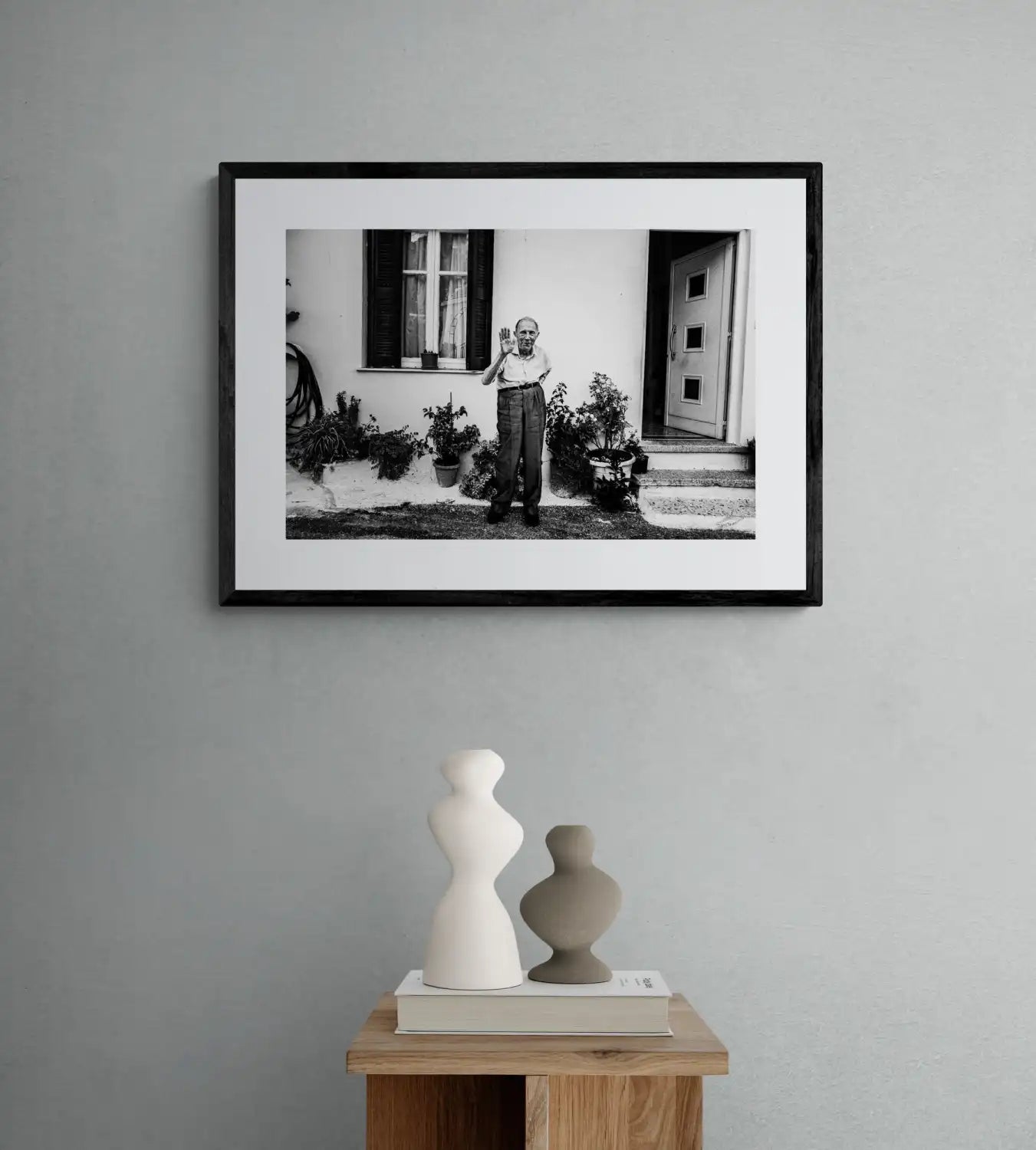 Black and White Photography Wall Art Greece | A man waving at Spilli Rethymnon Crete - single frame