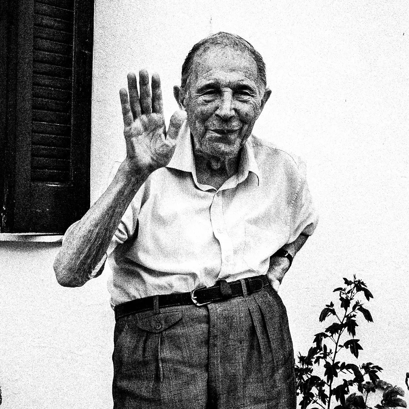 Black and White Photography Wall Art Greece | A man waving at Spilli Rethymnon Crete - detail view