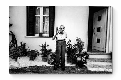 Black and White Photography Wall Art Greece | A man waving at Spilli Rethymnon Crete - whole image