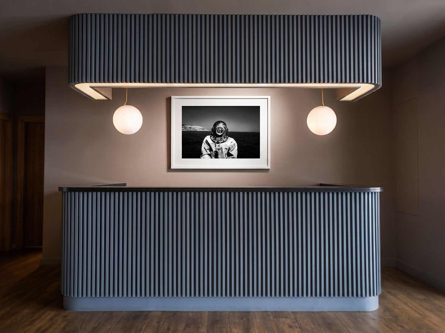 Sponge Diver photograph by George Tatakis displayed at Varoulko Michelin-starred restaurant in Piraeus, Greece