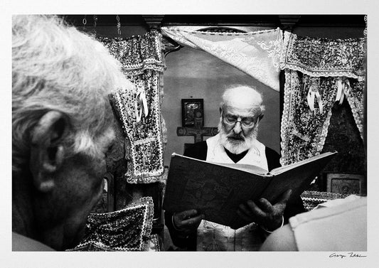 Black and White Photography Wall Art Greece | Priest reading the Gospel Olympos Karpathos Dodecanese by George Tatakis