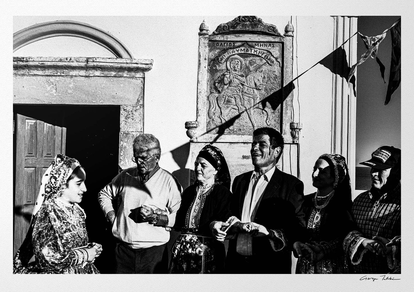 Black and White Photography Wall Art Greece | Dancing Pano Choros during a celebration at Saint Minas Olympos Karpathos Dodecanese by George Tatakis