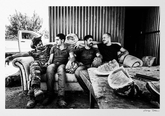 Black and White Photography Wall Art Greece | A group of men in a sofa after work Anogia Crete