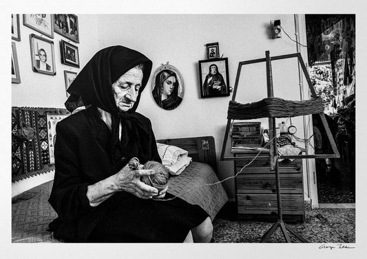Black and White Photography Wall Art Greece | Lady in Anogia working with a spinning wheel Crete by George Tatakis