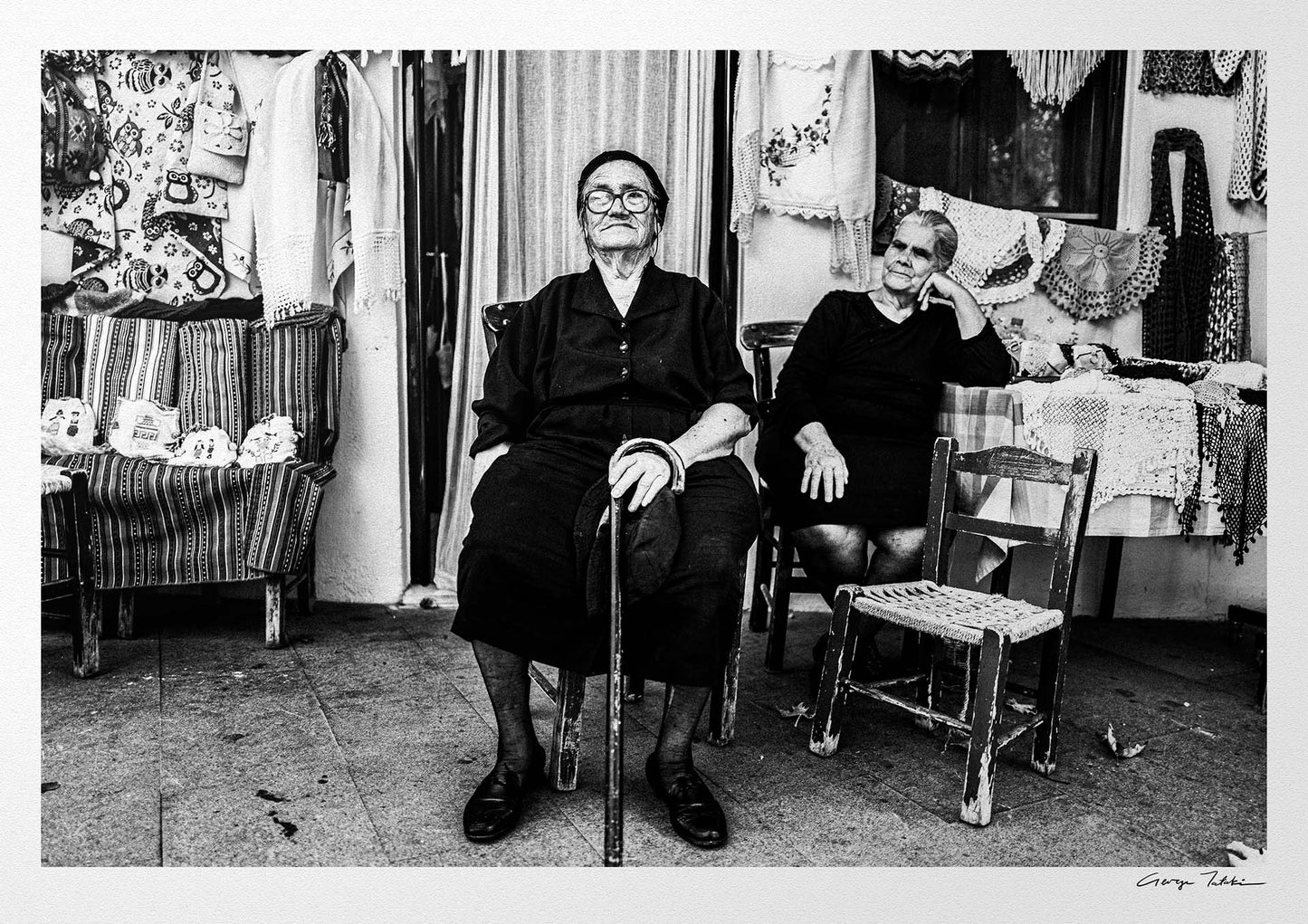 Black and White Photography Wall Art Greece | Two ladies in front of a local shop Anogia Crete by George Tatakis