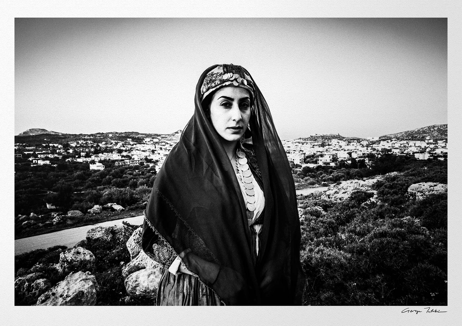 Black and White Photography Wall Art Greece | Traditional costume of Archangelos overlooking the town Rhodes by George Tatakis