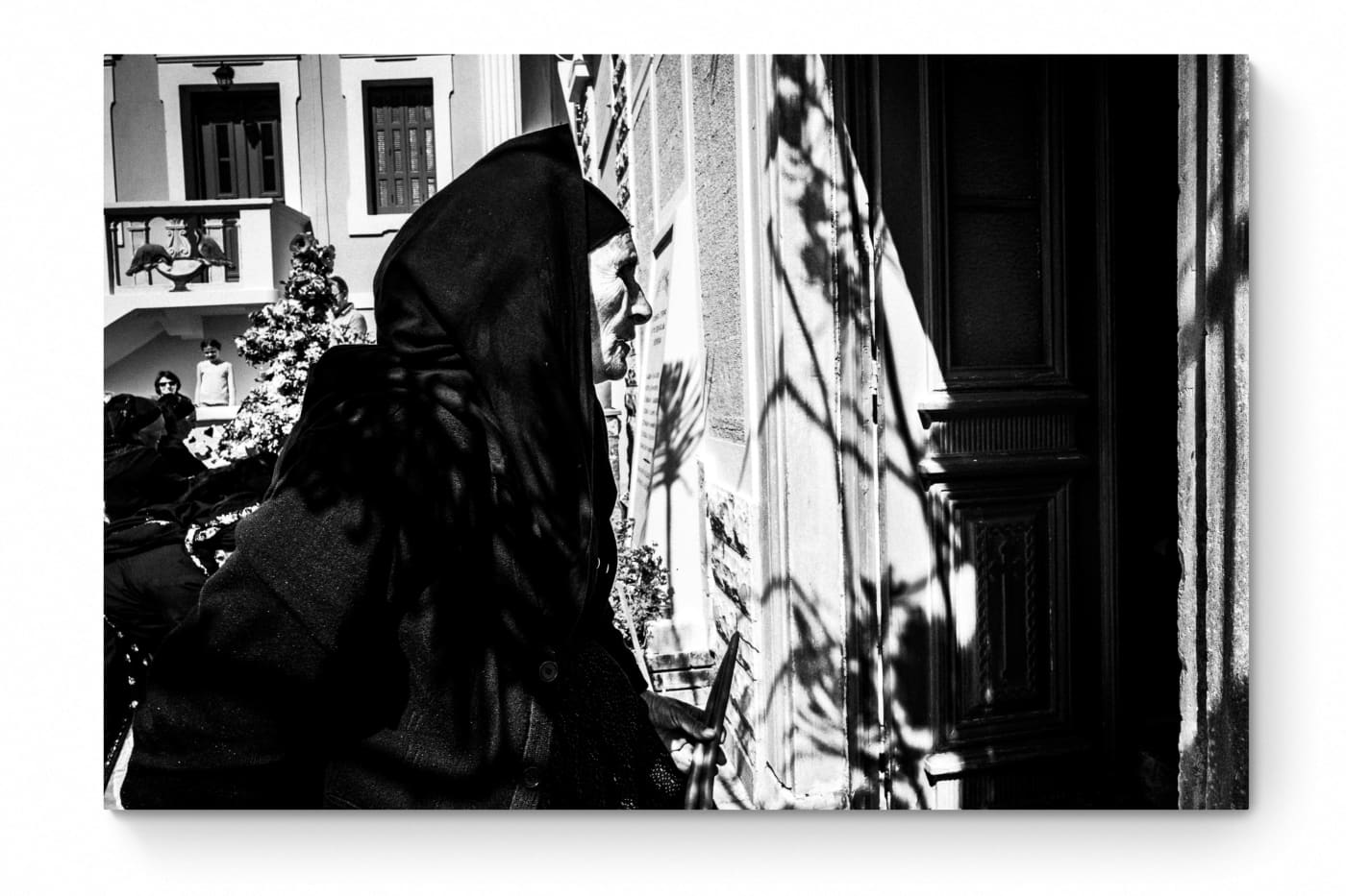 Black and White Photography Wall Art Greece | Woman entering the church Olympos Karpathos Dodecanese by George Tatakis - whole photo