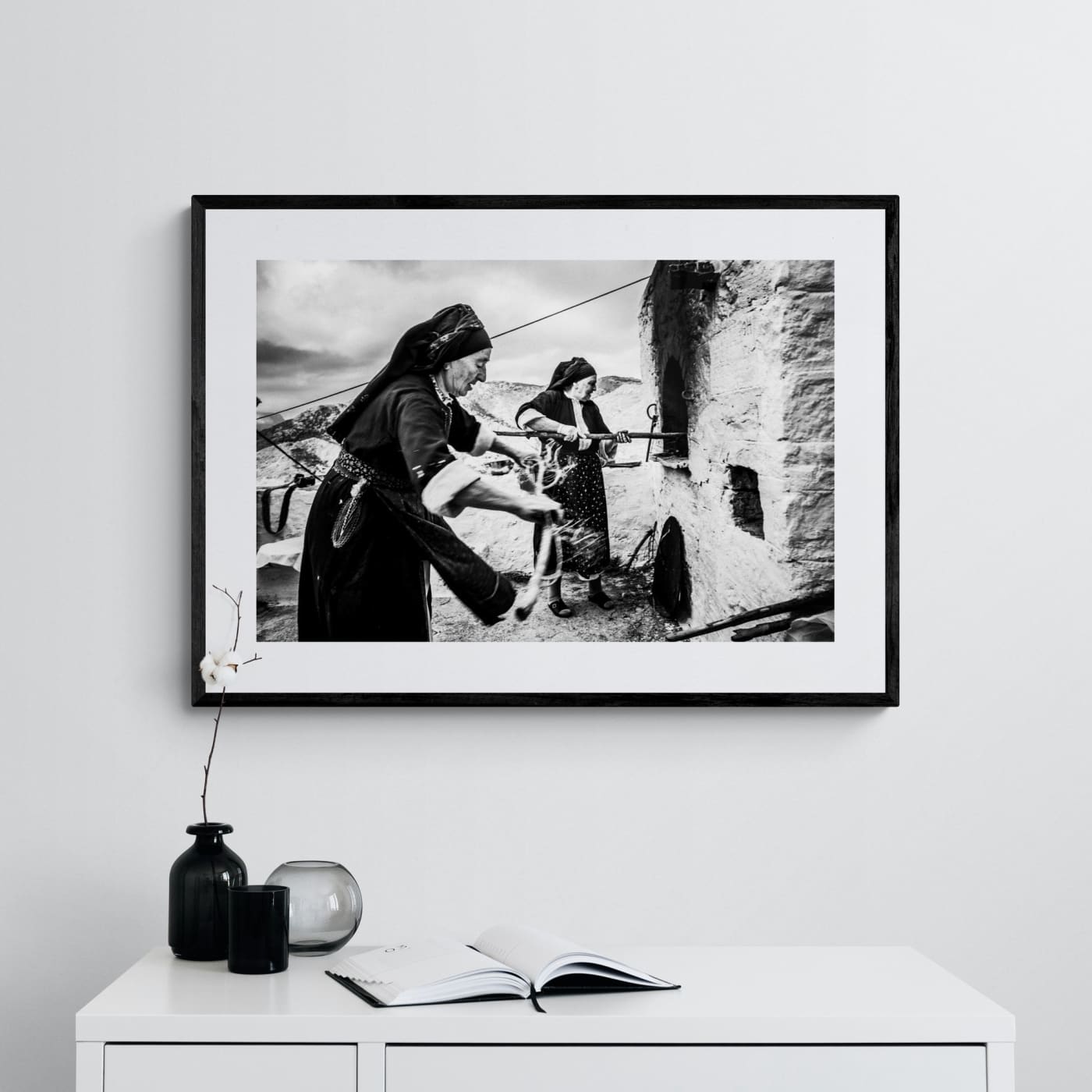 Black and White Photography Wall Art Greece | Women lighting up the wood oven Olympos Karpathos Dodecanese by George Tatakis - single framed photo