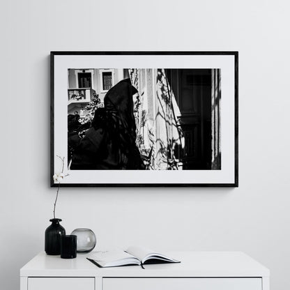 Black and White Photography Wall Art Greece | Woman entering the church Olympos Karpathos Dodecanese by George Tatakis - single framed photo
