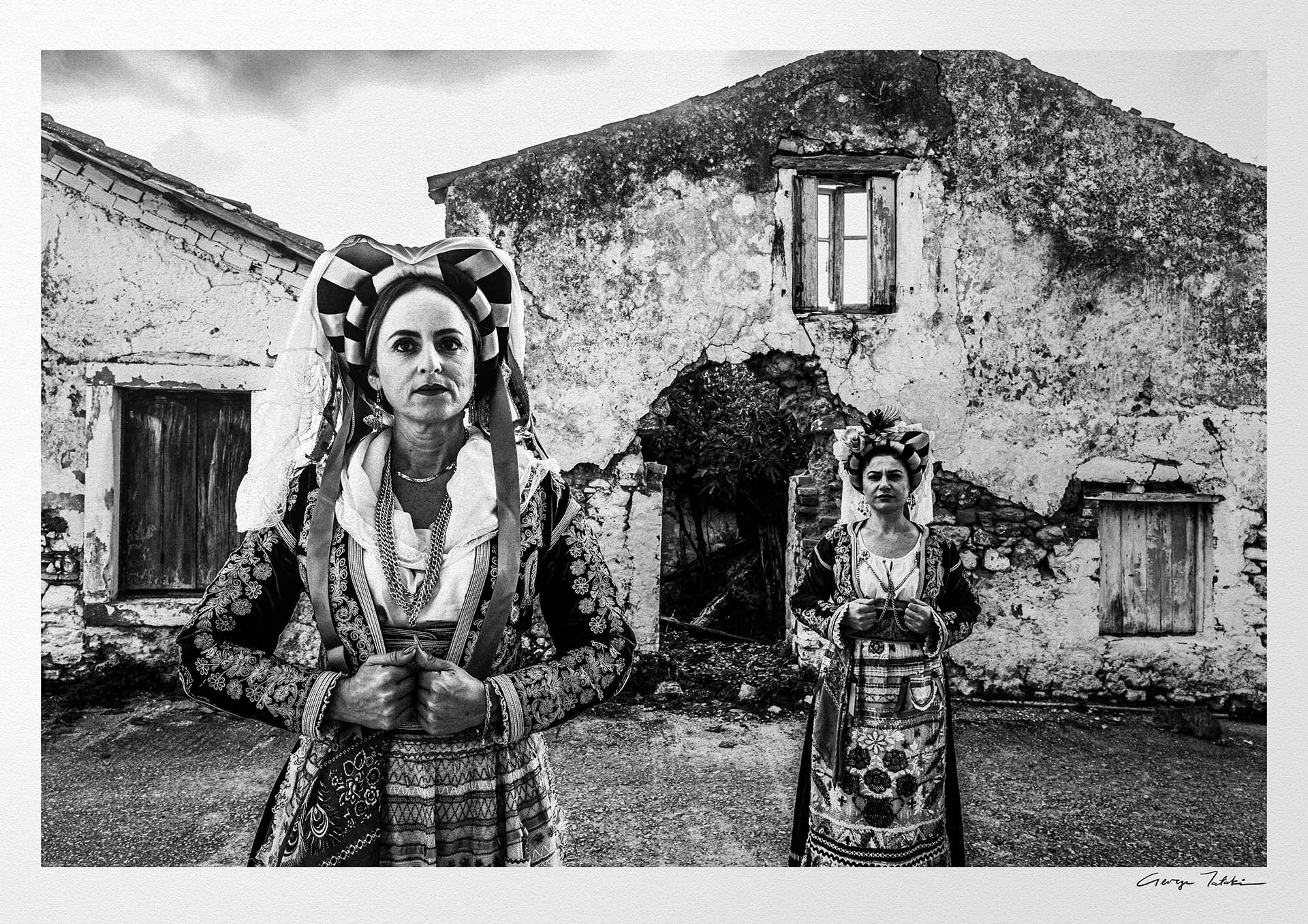 Black and White Photography Wall Art Greece | Costumes of southern Corfu island in front a traditional house Ionian Sea by George Tatakis