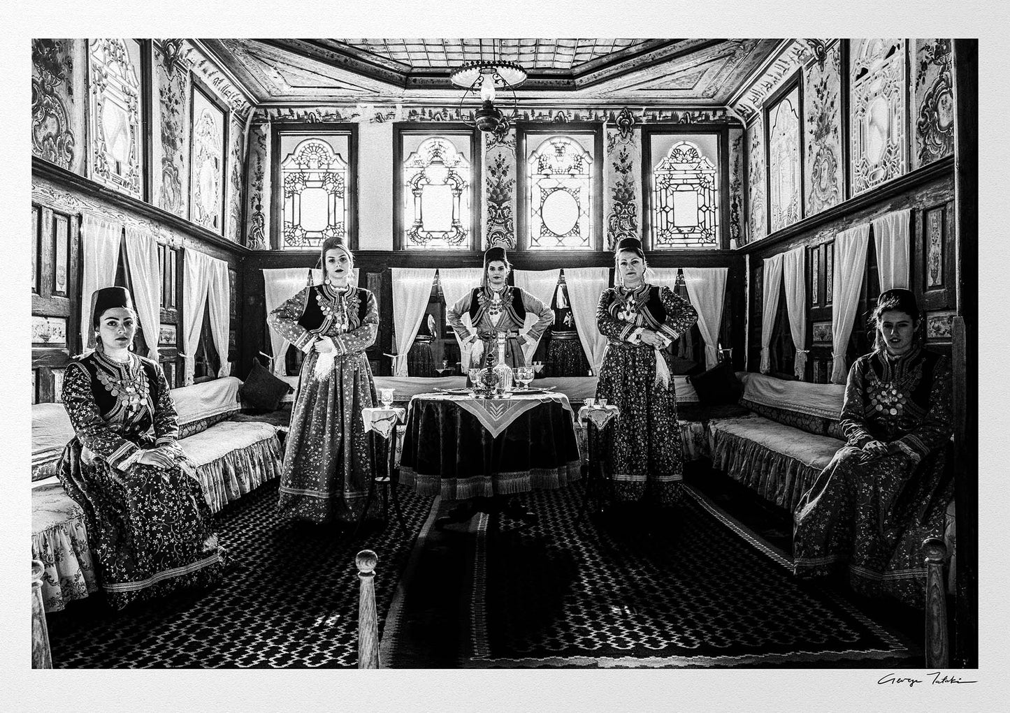 Black and White Photography Wall Art Greece | Urban costumes of Kastoria in a traditional living room W. Macedonia by George Tatakis