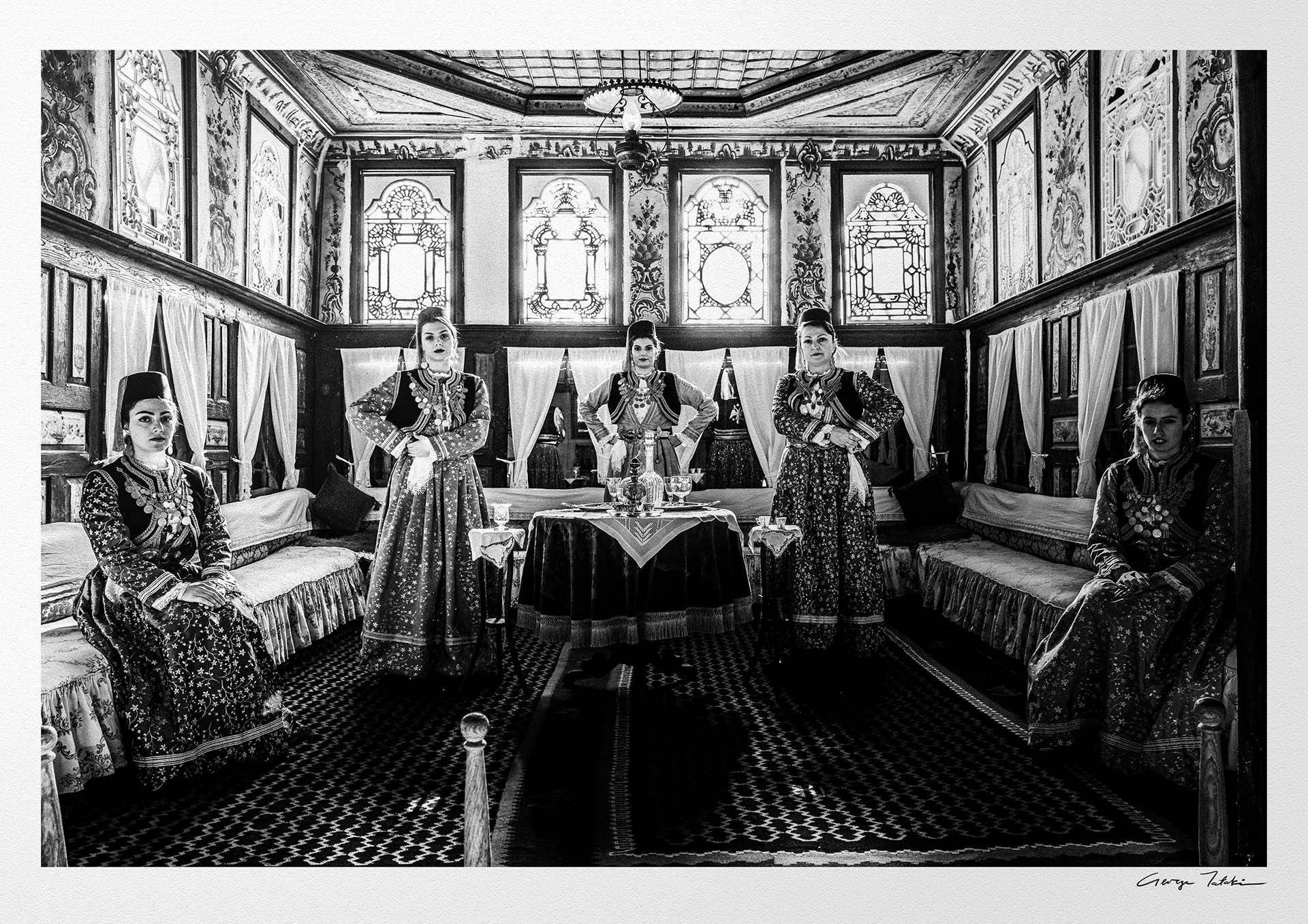 Black and White Photography Wall Art Greece | Urban costumes of Kastoria in a traditional living room W. Macedonia by George Tatakis