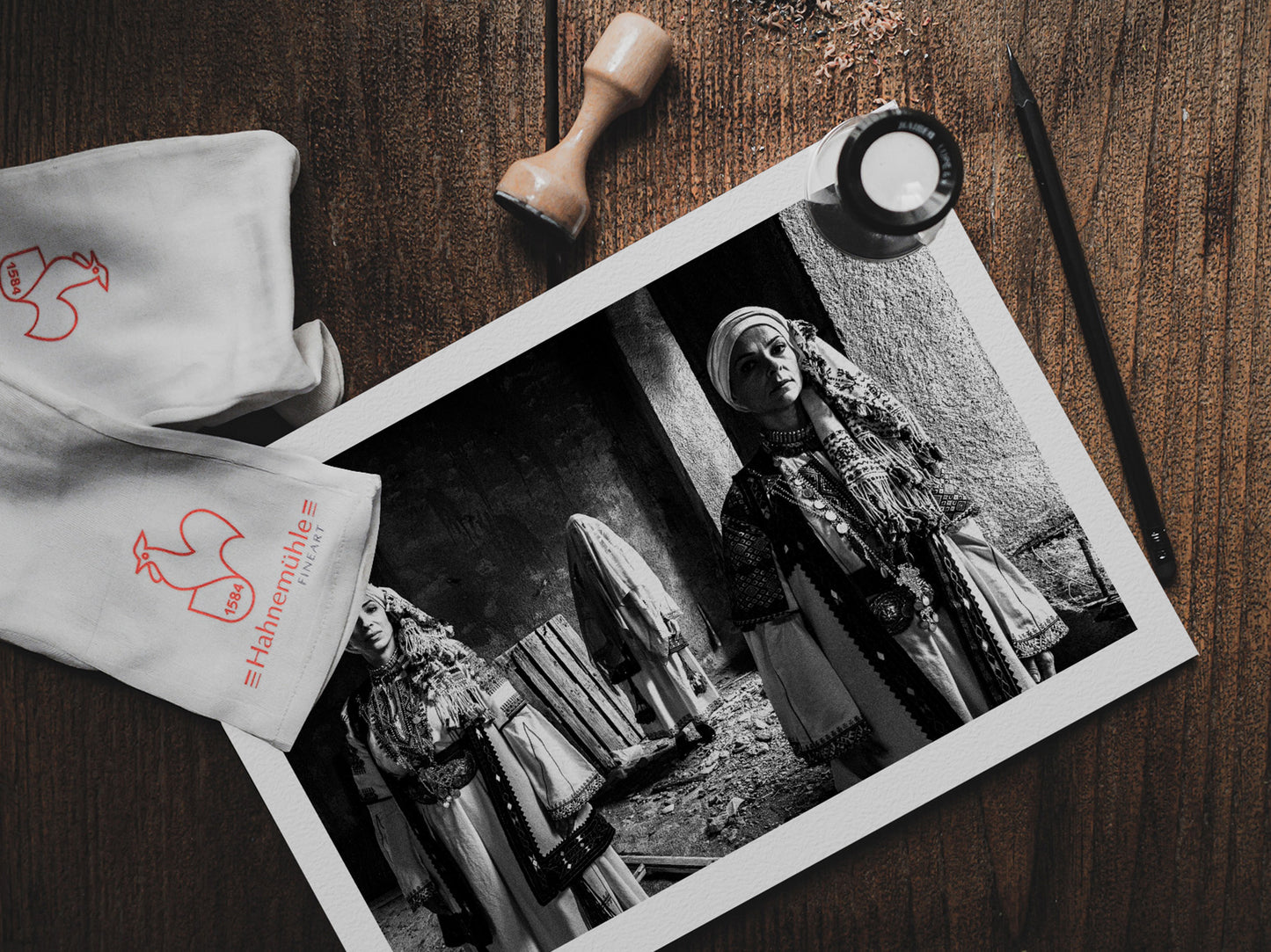 Veiled bride and two women in Kyparissia costumes, Peloponnese, Greece. Black and white photography print on a table by George Tatakis.
