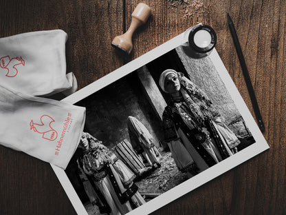 Veiled bride and two women in Kyparissia costumes, Peloponnese, Greece. Black and white photography print on a table by George Tatakis.