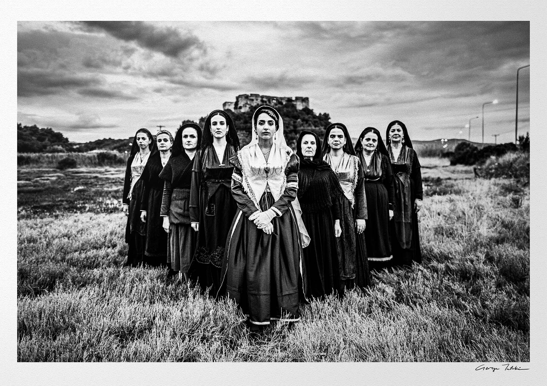 Black and White Photography Wall Art Greece | Costumes of Lefkada island at a castle multiple generations Ionian Sea by George Tatakis